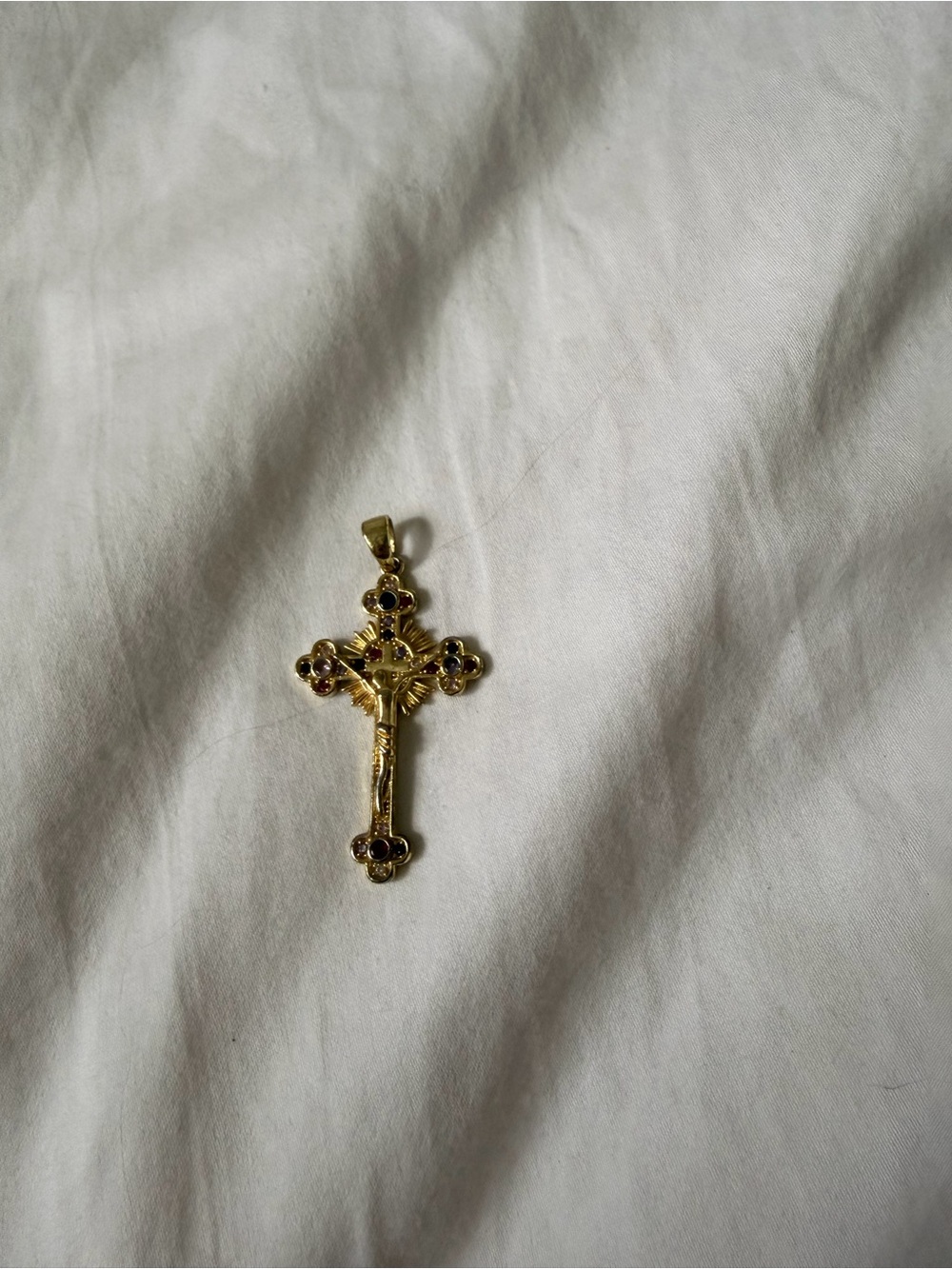 Gold-Tone Cross Pendant with Red Gem Accents